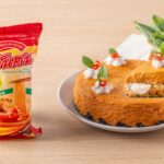 Alt Text: เค้กห่อหมกวุ้นเส้นปู เนื้อปูเต็มคำ เสิร์ฟพร้อมใบโหระพา